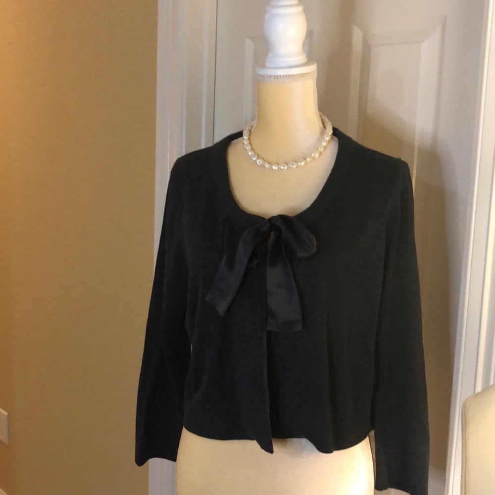 Black Sweater jacket with satin tie.